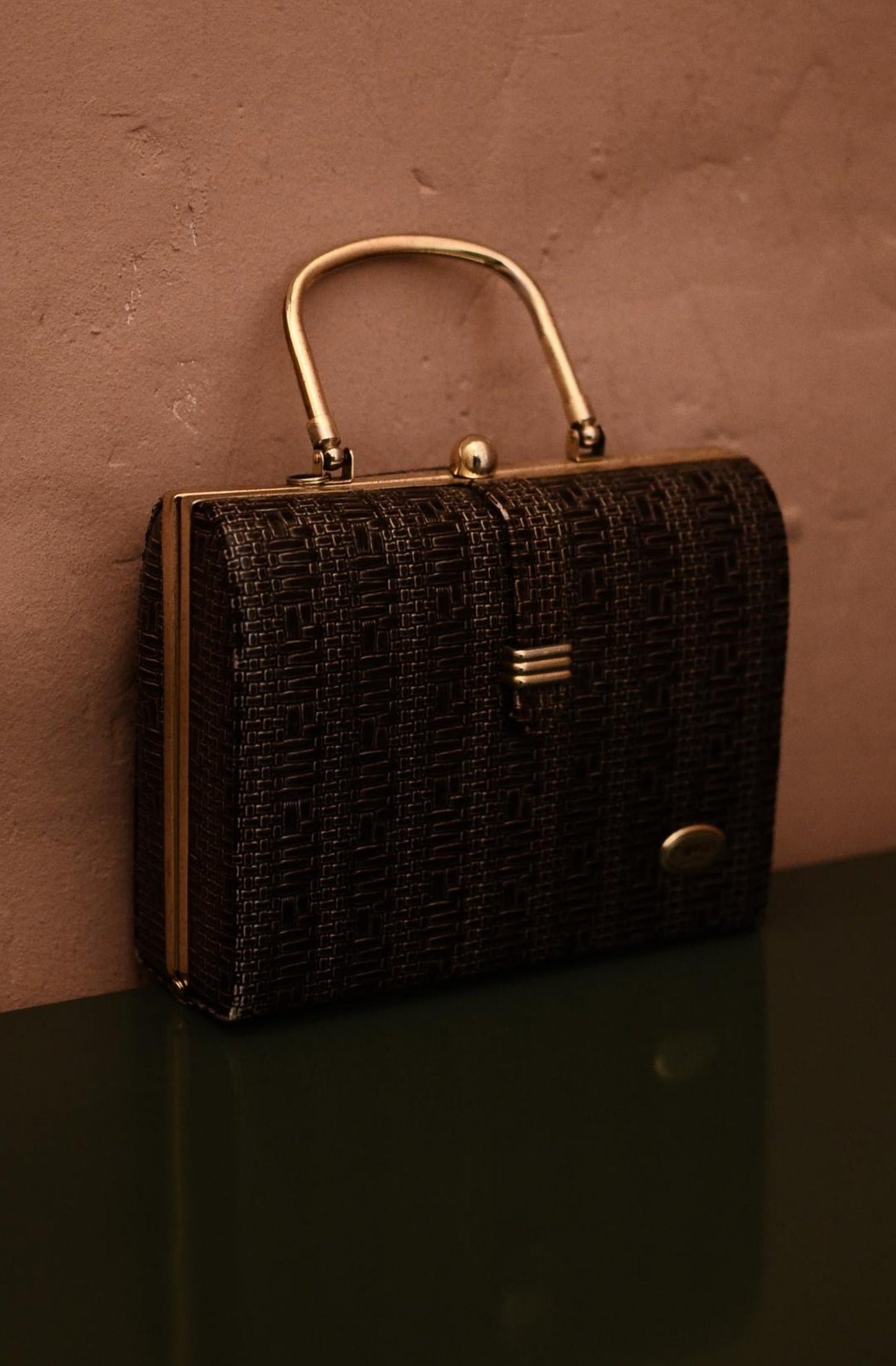 Old fashioned handbag with metal handle